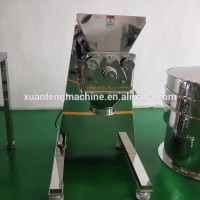 Machine for the integration of wet powder into granules